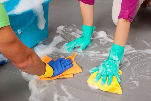 Carpet cleaning team working safely with protective equipment in Gipsy Hill